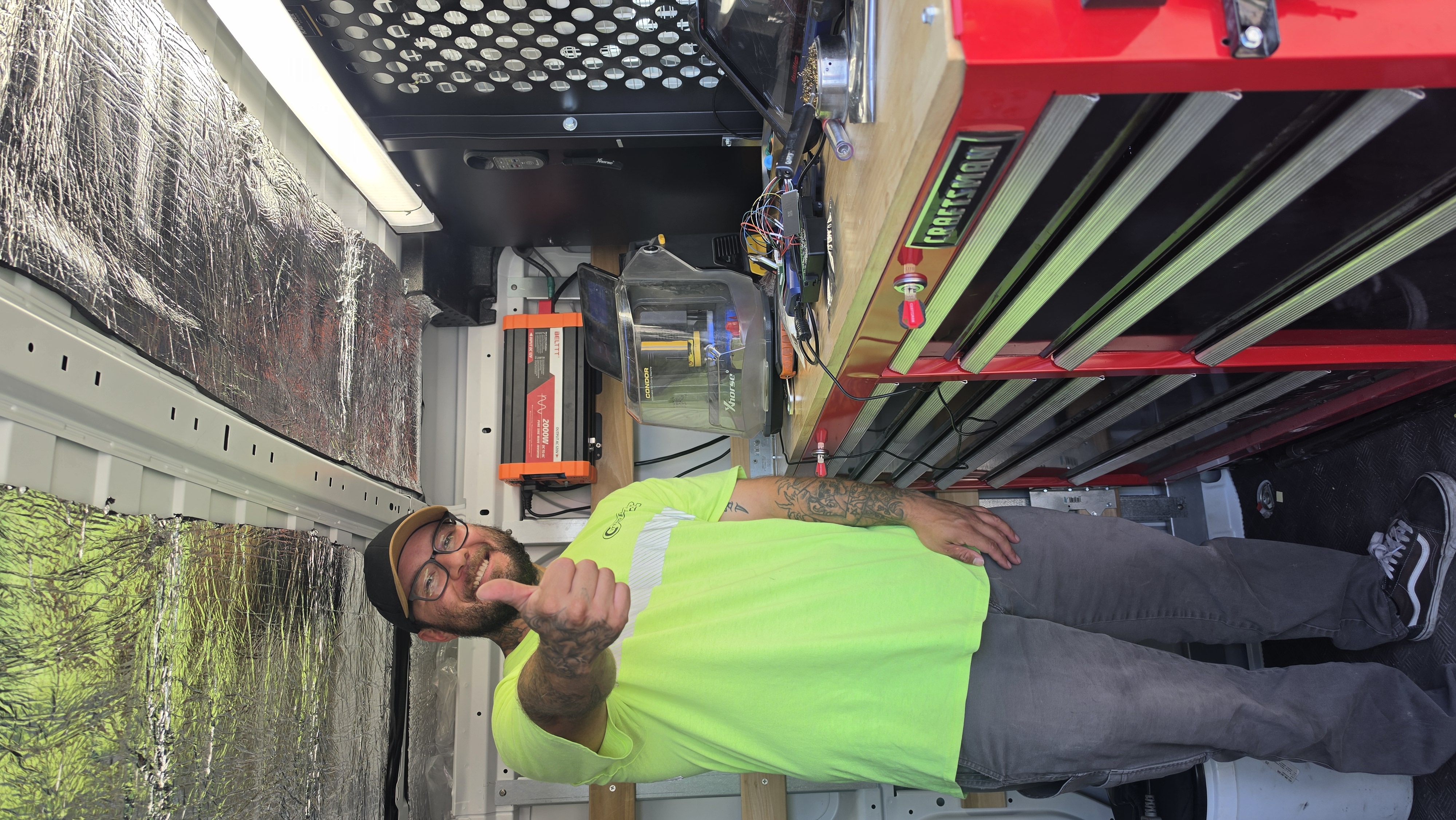 Cutting Edge technician inside the fully equipped mobile locksmith van
