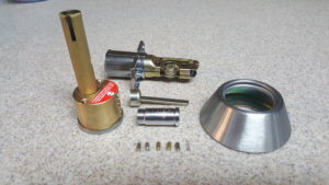 Disassembled lock cylinder and rekeying components